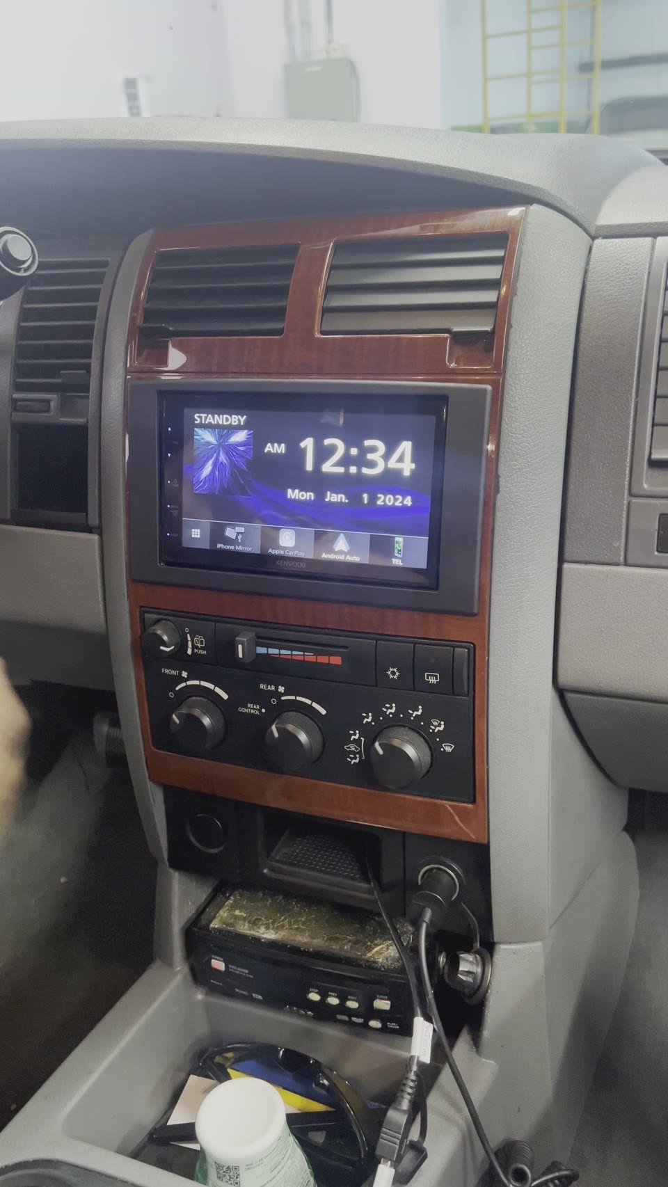 Kenwood multimedia receiver integrated into a factory dashboard