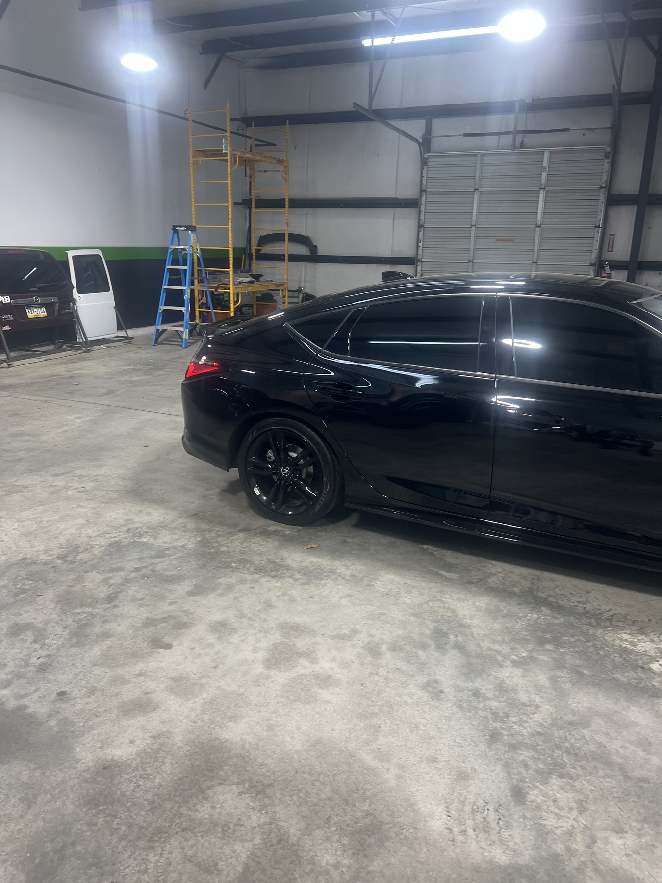Black SUV with a clean professional automotive window tint installation