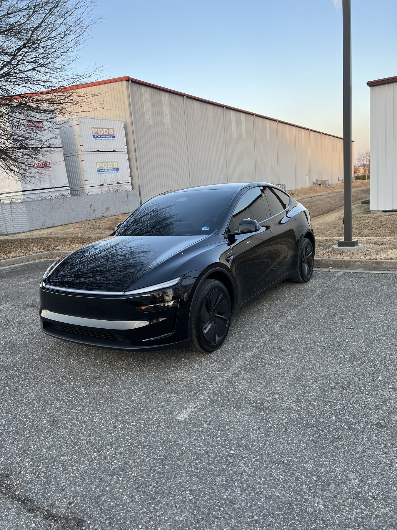 Black Lucid sedan with professionally installed dark automotive window tint