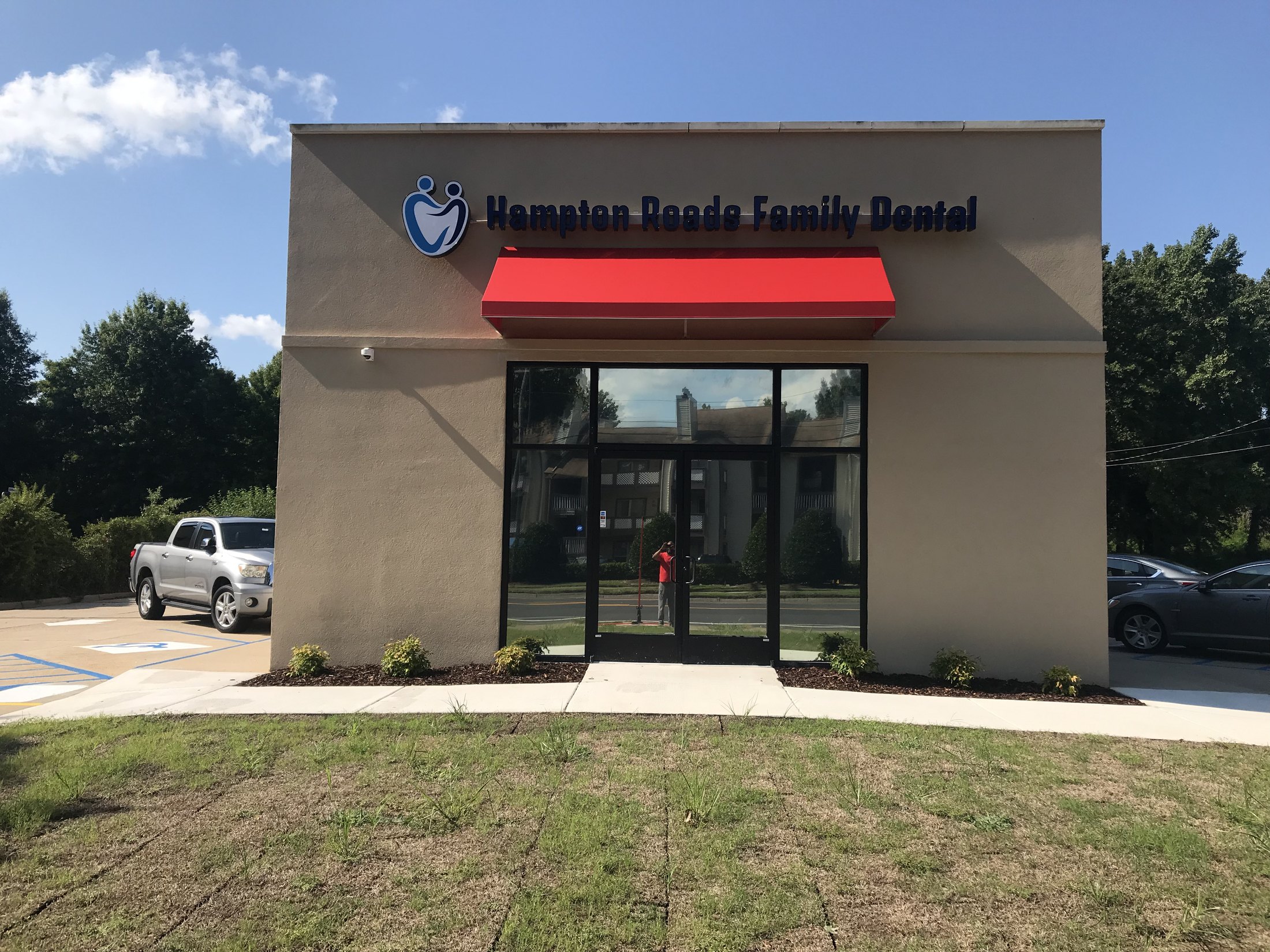 Completed solar window film on the front glass of a dental office