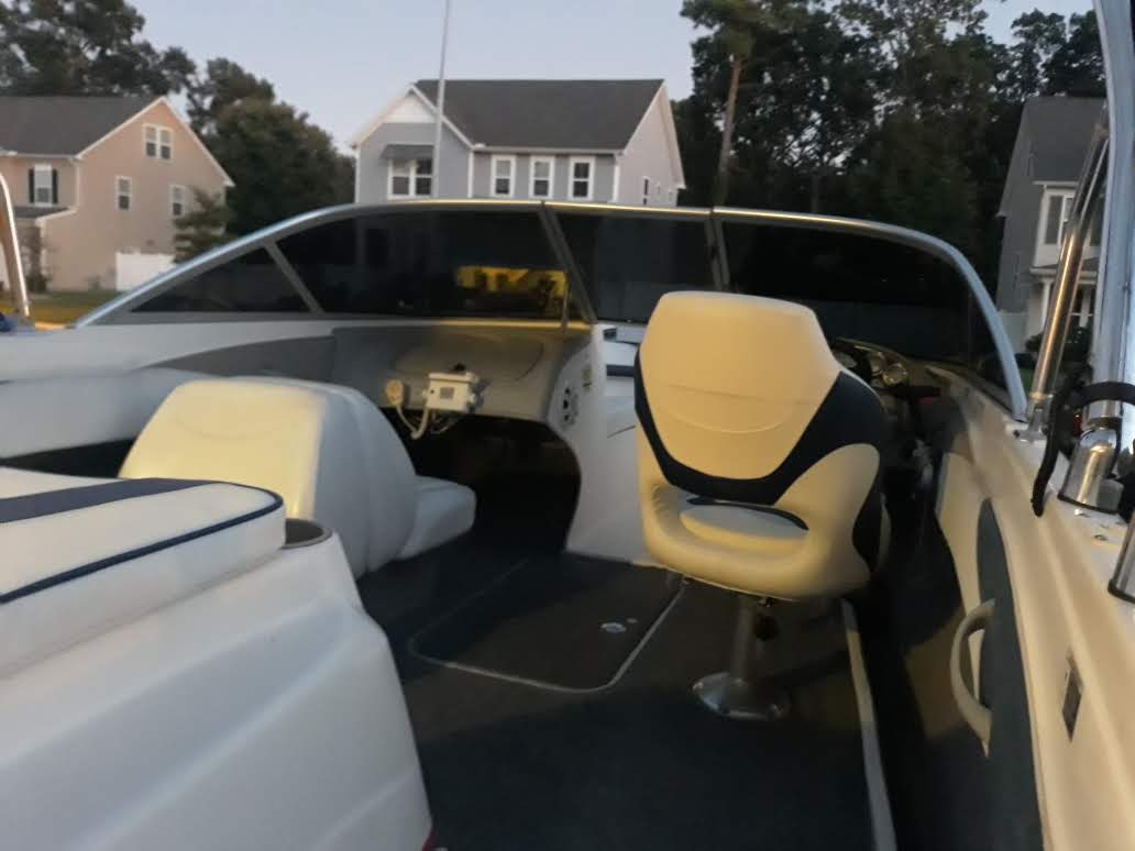 Rear cockpit view of a boat with finished dark windshield tint