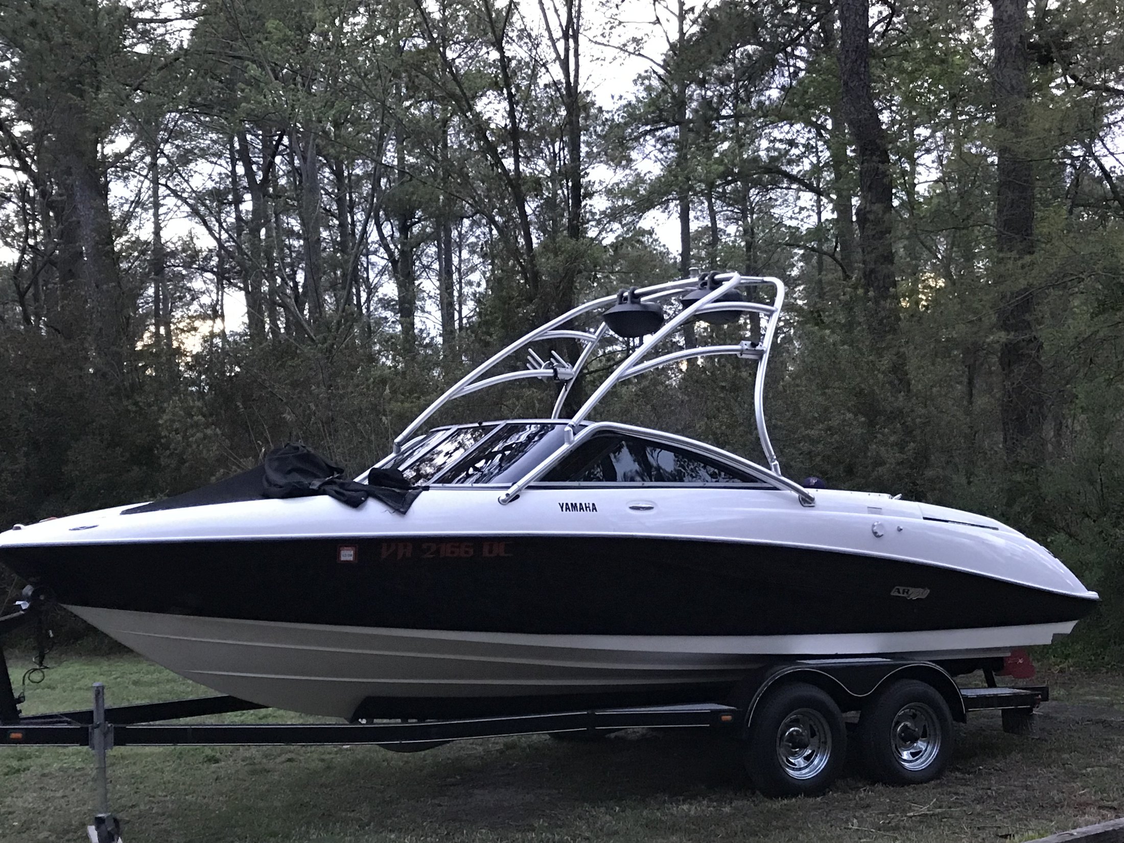 Wide side view of a Yamaha boat with completed marine window tint