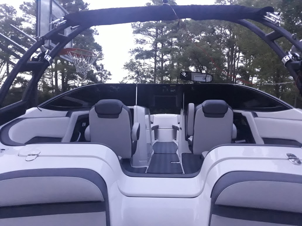 Tinted wraparound marine windshield viewed from inside a Yamaha boat