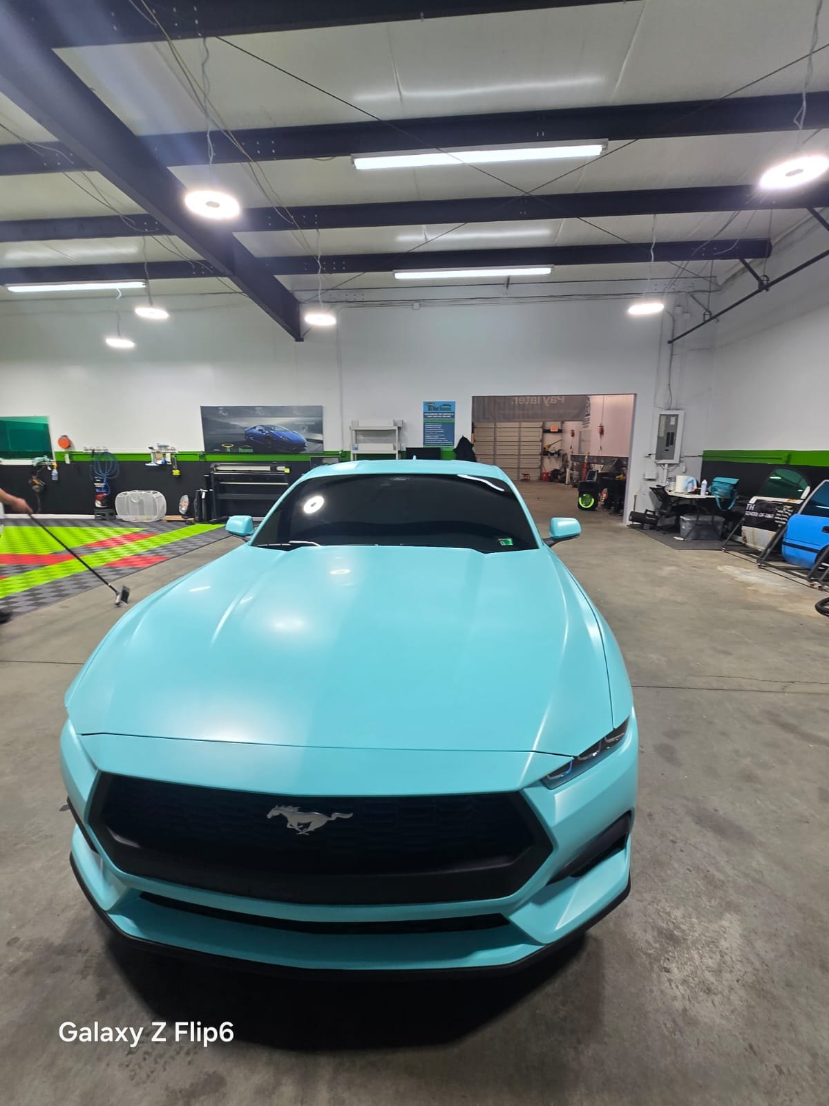 Mint satin wrapped Ford Mustang completed by Tint Heaven