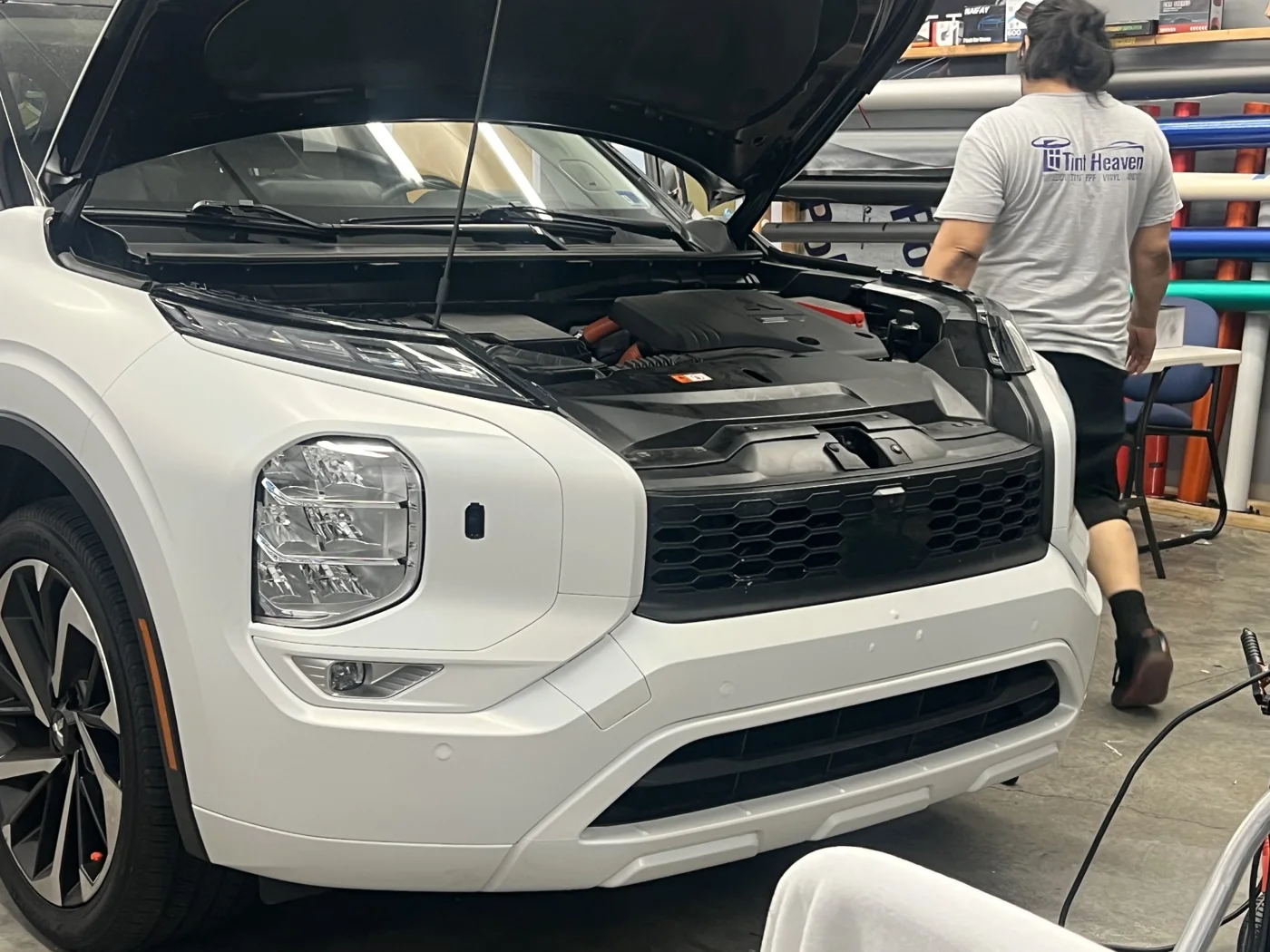 Front of the Outlander in the shop during wrap work