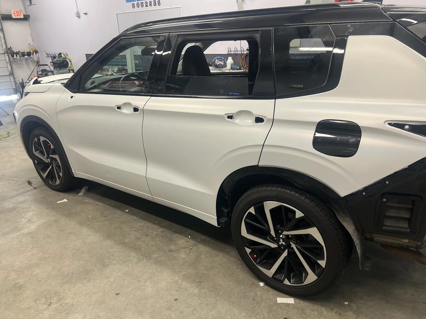 Outlander side panels in the Tint Heaven shop during wrap preparation