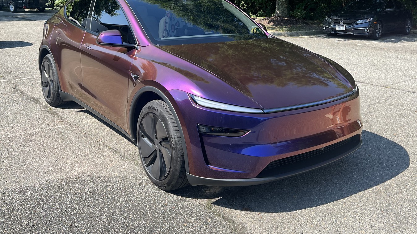 Completed color-shift vinyl wrap on a Tesla installed by Tint Heaven